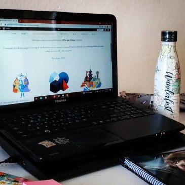 constantina-maud-fantasy-wirter-workspace-desk-with-laptop-notebook-postits-and-bottle